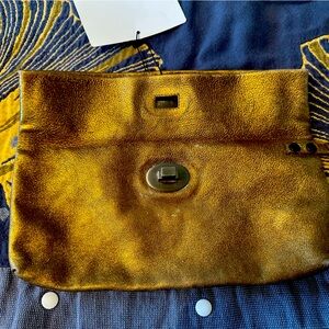 MIU MIU bronze leather wristlet.